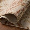 Folded corner highlights rug’s thickness and woven backside texture