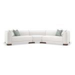Curved lounge sectional sofa in white chenille with rounded edges and exposed French Roast wood feet
