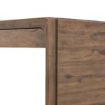 Top view of Henry Desk showing consistent wood grain texture and rounded panel edges