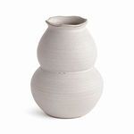 Chyrssa Vase with matte finish, subtle ridges, weighty feel, and bulbous double-gourd shape in light cream color