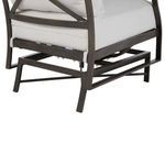 Close-up detail of chair base with white cushions highlighting frame structure and cushion supports