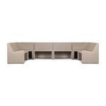 Side profile of outdoor banquette highlighting woven natural rattan and sleek shape
