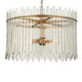 Lower close-up focusing on pointed ends of textured glass bars illuminated from internal bulbs