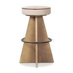 Front view of the Damon swivel stool highlighting the symmetrical wooden base and round beige cushion