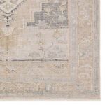 Close-up corner view highlighting faded floral pattern and muted color wash detail