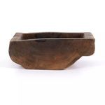Side profile highlighting the curvature, thickness, and natural edge details of the wood bowl