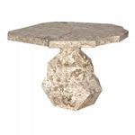 Close-up side view showing detailed texture and shapes of the faceted marble base and top edge
