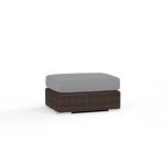 Montecito Ottoman with Cognac multi-colored resin wicker base and thick gray cushion