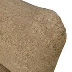 Close-up of upper backrest corner displaying textured floral upholstery detail