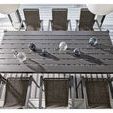 Overhead shot of Seneca Dining Table set with decorative spheres and surrounded by woven chairs