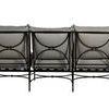 Back view showcasing geometric circle pattern on sofa frame and cushion backs