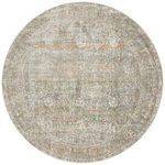 Round version of rug featuring the same distressed traditional pattern and neutral color palette
