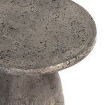 Close-up of the textured concrete surface and edge of the Collins Outdoor Accent Table top