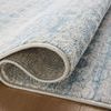 Rolled edge showing binding and underside weave of Kamala Sky Dove rug