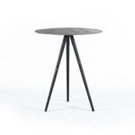 Alternate view focusing on hammered texture of the black metal tabletop edge and legs