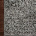Corner close-up revealing detailed pattern and thin border on dark wood flooring