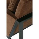 Focus on left rear chair frame where metal meets upholstery at sharp angle
