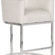 Side angle view showing sleek armrest curve and polished nickel base with a semi-circle footrest