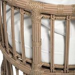 Close-up of side rattan weave structure and edge of off-white cushion