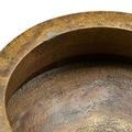Detailed top view showing bowl’s rough antique bronze interior and rim markings