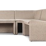 Close angle showing seat cushions and surrounding woven rattan frame