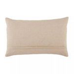 Back of pillow in solid beige fabric with horizontal zipper closure