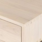 Close-up detail of drawer edge highlighting dovetail wood joints