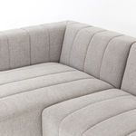 Top view close-up of sectional corner showing soft fabric and vertical channel details
