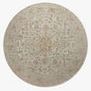 Round version of Rosemarie Ivory / Natural Rug featuring central medallion with soft neutral colors
