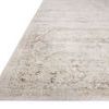 Marcella rug shown from an angled side view highlighting low profile texture and woven edge