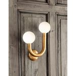 Happy Sconce Right Asymmetrical mounted on rustic wooden paneled wall showing side profile