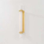Side view of Groveland Station sconce highlighting metal backplate curvature