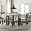 Three Ciao Bella stools styled around farmhouse dining table in bright modern room