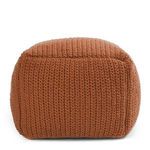 Front view of the rust handwoven square pouf showing knitted vertical stitch pattern