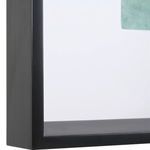 Detailed corner view of matte black frame with white mat