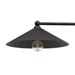 Close-up of one conical shade with visible clear bulb beneath