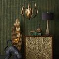 Close-up showing texture and subtle finish variations on brass metal leaves and glass globe