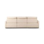 Rear view of the three-seat sectional showing clean upholstery and separated back cushions