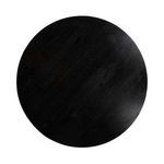 Top view of black round mango wood tabletop with subtle wood grain