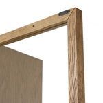 Flat back panel of the cabinet showing smooth natural oak wood surface