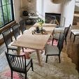 Alternate angle of Miller Dining Table in styled room emphasizing table scale with chairs