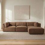 Matina Lounge Modular Sectional styled in a minimalist room with light wall art and plush neutral rug