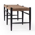Close-up angle of Wyatt Bench highlighting sleek black oak leg and crossbar construction