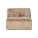 Front view focusing on plush shaggy upholstery and squared stitching details of the chair