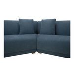 Close-up view of interior sectional corner with two loose back cushions and detailed fabric texture
