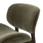 Close-up of chair’s upper backrest in olive chenille with smooth fabric finish