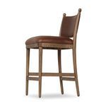 Three-quarter rear view of Bella Bar + Counter Stool highlighting frame and seat angle