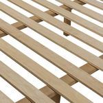 Close-up of wooden slats supporting mattress, showing natural wood grain and sturdy construction