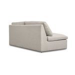 Back and right-side view of the Miles outdoor sofa showcasing full fabric upholstery and cushion support.