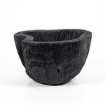 Top-down view inside large bowl showing rough carved wood texture and cracks